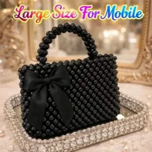 Handmade pearl bag with ribbon bow detail